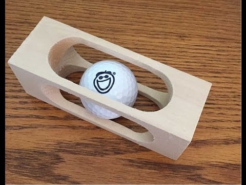 Mystery Golf Ball in a Block of Wood (WoodLogger.com)